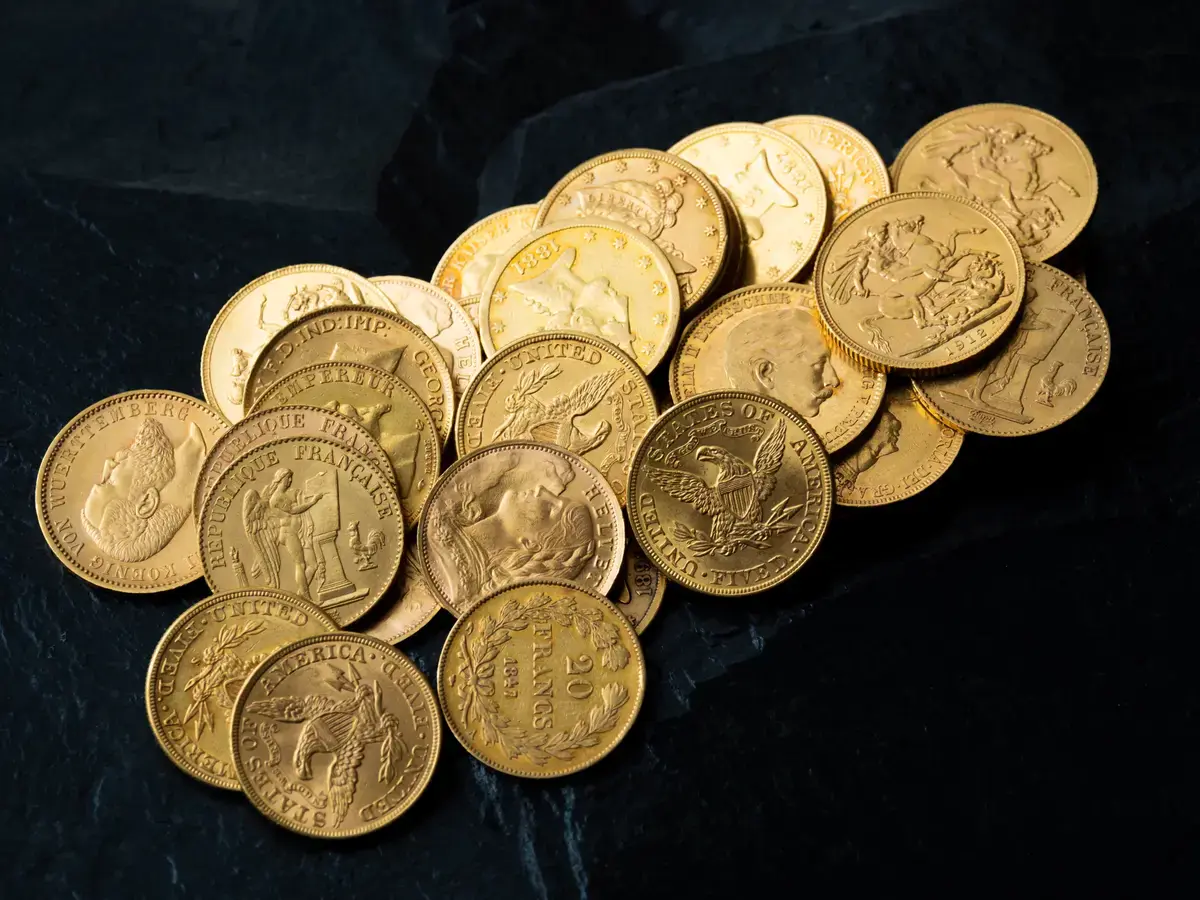 Comparison of gold jewelry in different karats showing 10K, 14K, 18K, and 24K gold items with their respective values