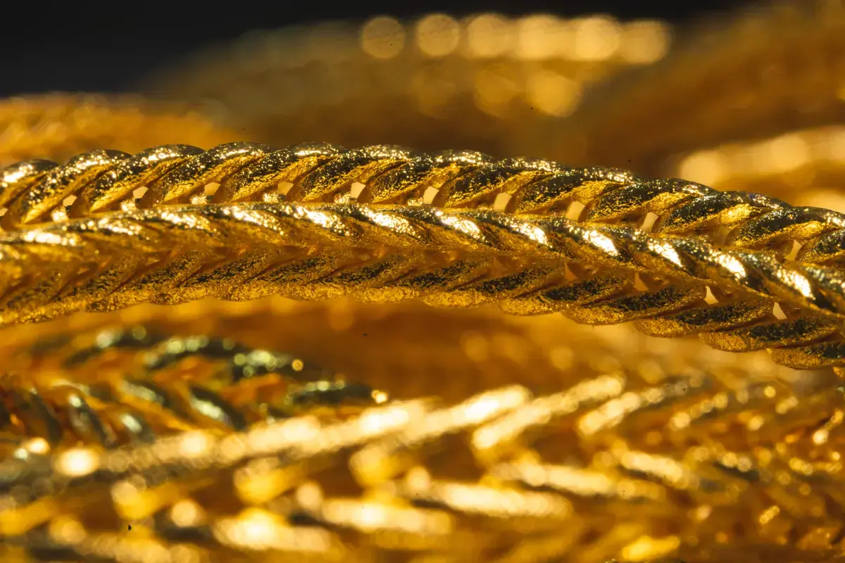 Gold jewelry collection including rings, necklaces, and bracelets arranged for appraisal at GoldAgo Toronto showroom